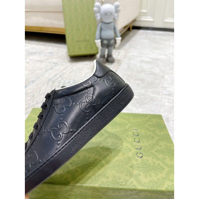 Gucci Men's Ace Sneakers in Black GG Embossed Leather GGSS24305